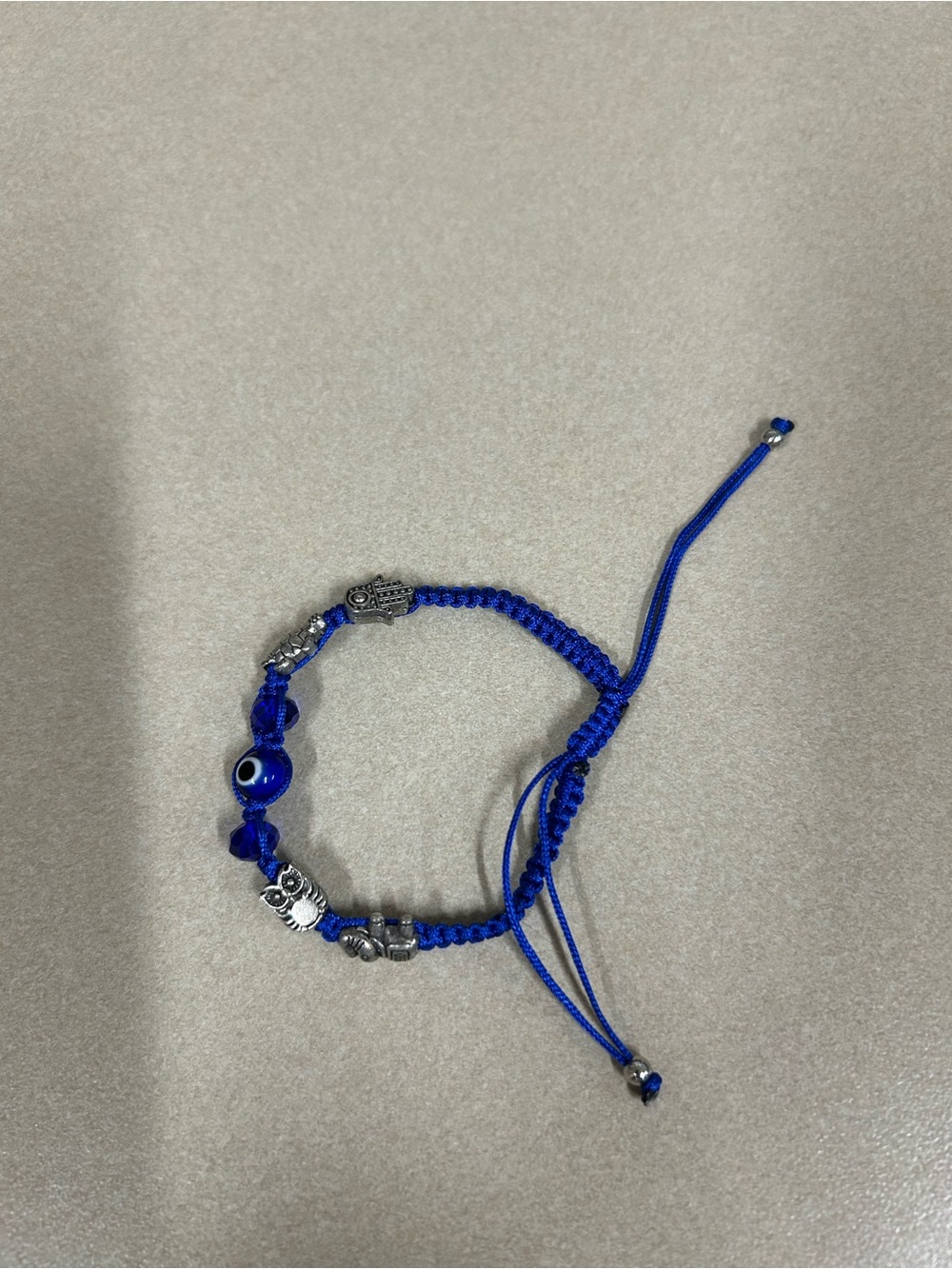 Adjustable Blue Charm Bracelet with Silver Accents